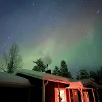 Lumi Hill - Northern Lights Inari